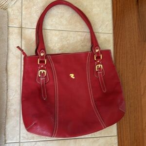 Robert Petrie made in Spain, red leather purse